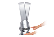 The Dyson AM09 ファンヒーター (ホワイト/ニッケル) bladeless fan heater. Easy tilt. AM09 pivots on its own center of gravity, staying put without clamping