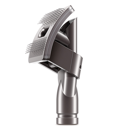 Front view of Dyson Groom tool for vacuum cleaners. Dyson pet grooming accessory removes hair from your dog before it is shed around the home.